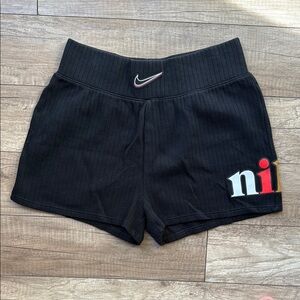 Nike Black Athletic Shorts with Distinctive Design